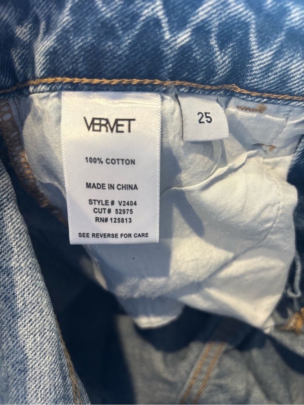 Women's Distressed High-Rise Cropped Jeans in Light Blue - Picture 3 of 3